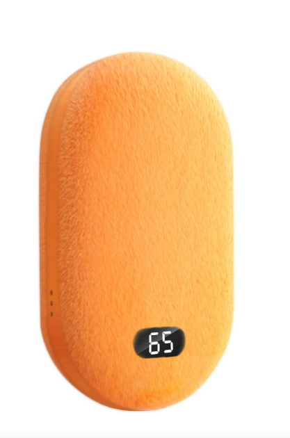 Orange plush hand warmer with a digital display on a white background